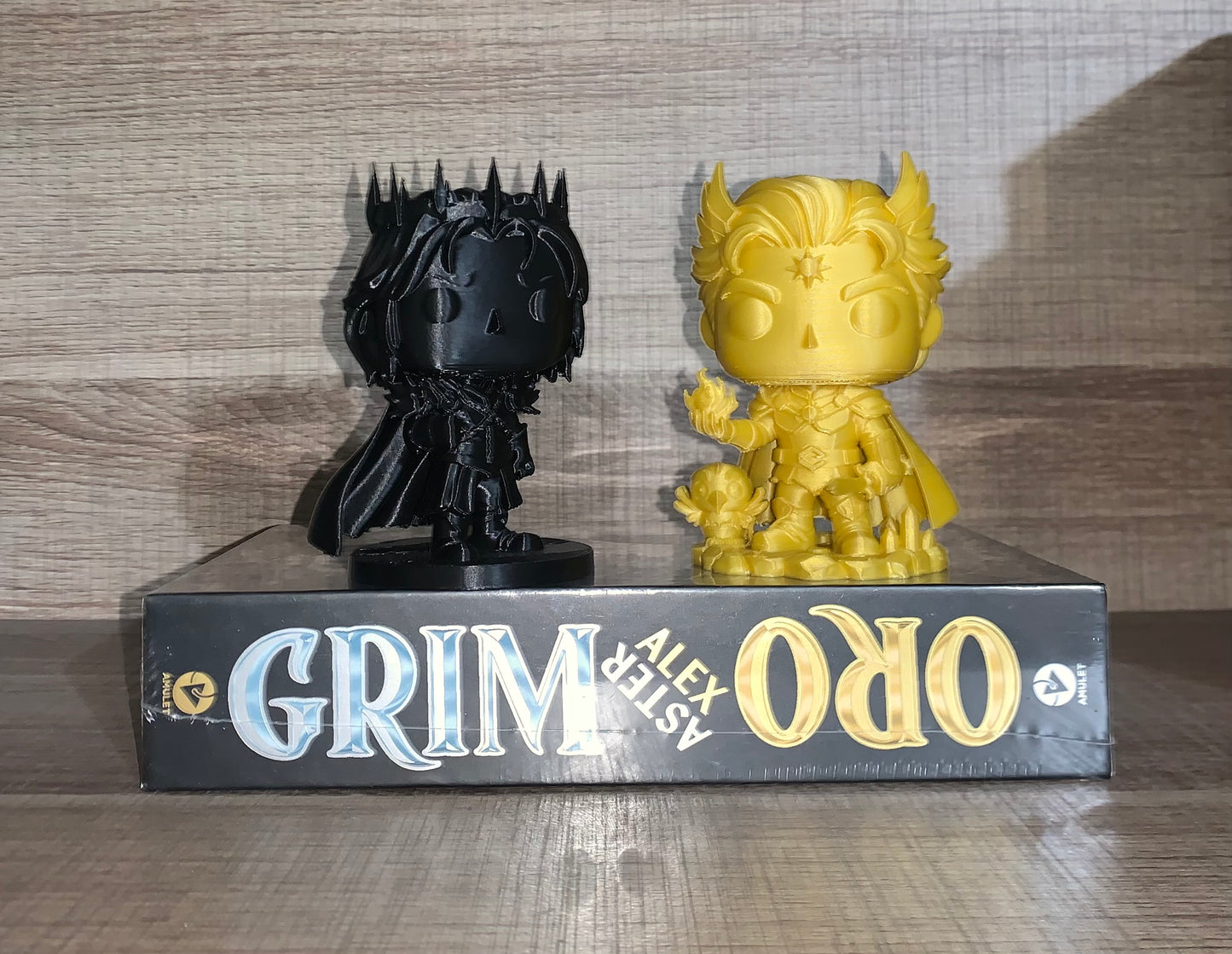 Grim & Oro Figurine set